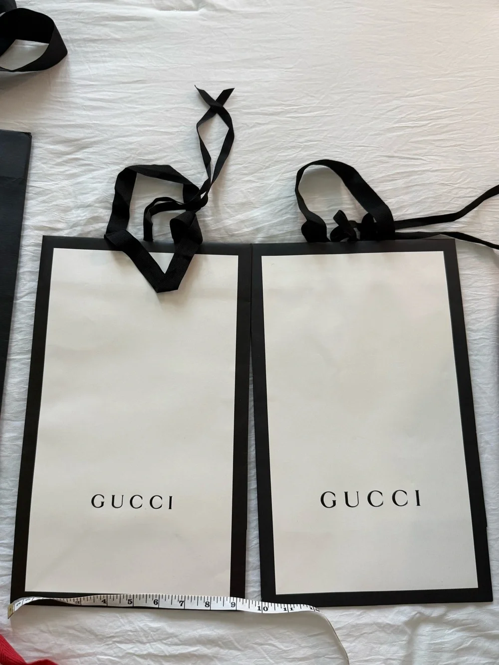 Lot of Designer gift bags: LV limited edition, two Gucci and one YSL